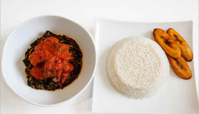 White Rice with Efo riro stew Goat from Nigerian Breeze